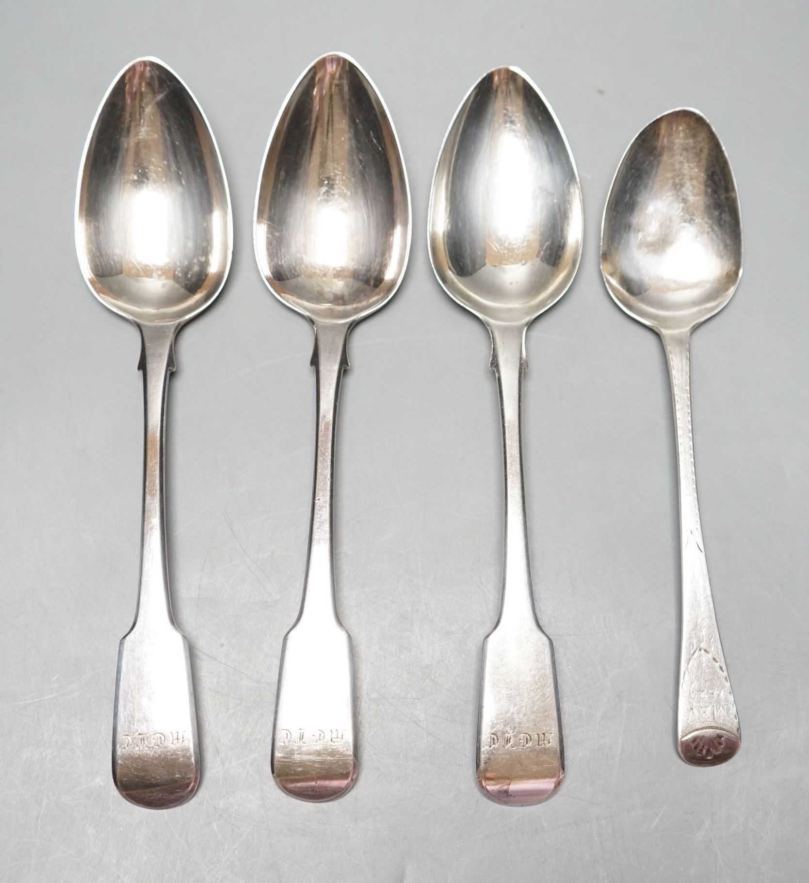 A set of three George IV silver tablespoons, by William Bateman, London, 1822 and a later silver dessert spoon, 231 grams.